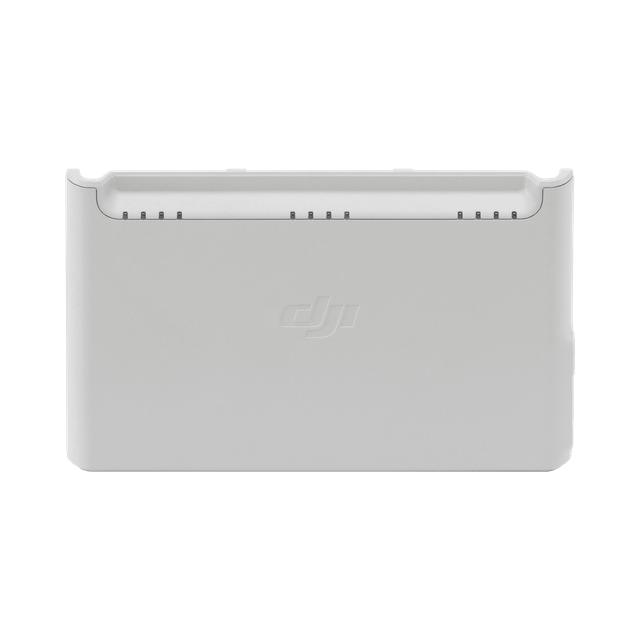 DJI NEO Fly More Combo with compact FPV-style drone, propeller guards, remote controller, three intelligent batteries, charging hub, and shoulder carrying case.