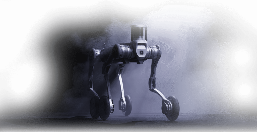 Unitree B2 W quadruped robot equipped with advanced sensors and ruggedized frame, designed for AI navigation, industrial inspection, and outdoor robotics research.