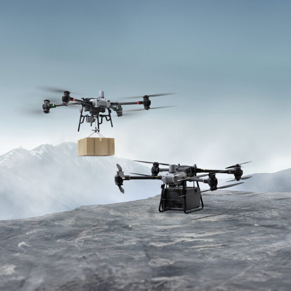 DJI FlyCart 30 industrial delivery drone with dual-propeller system, cargo hook mechanism, and rugged build designed for aerial logistics and payload transport