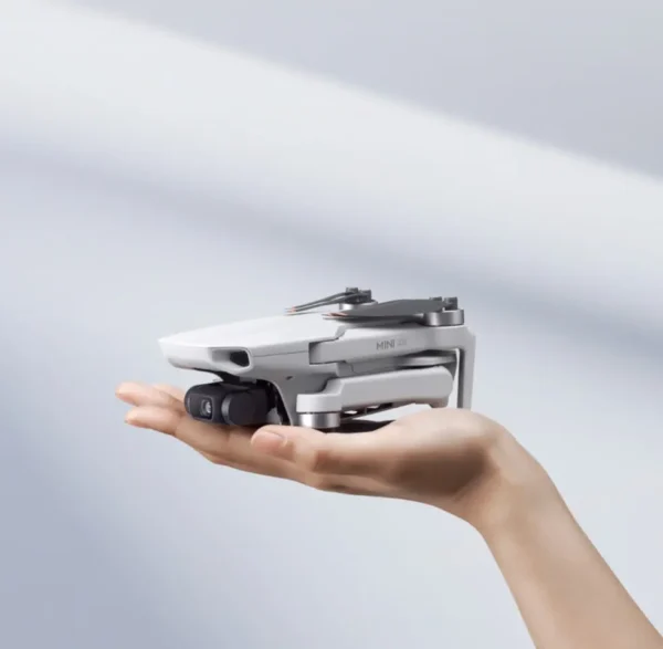 DJI Mini 4K Fly More Combo with ultra-light drone, remote controller, three intelligent flight batteries, charging hub, spare propellers, and carrying case.