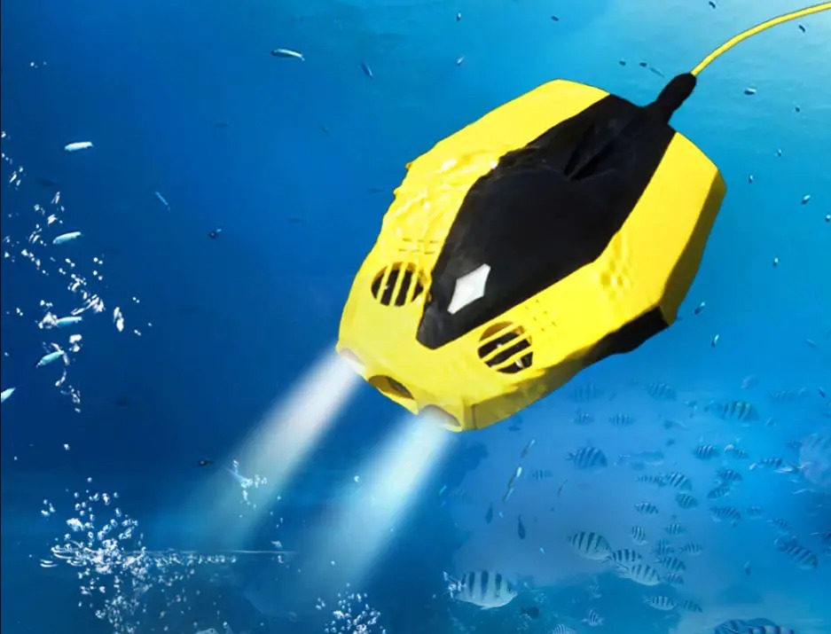 Chasing Dory mini underwater drone exploring ocean with bright yellow body