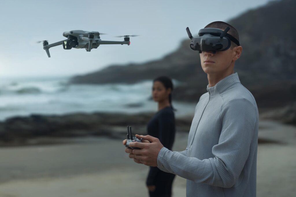 DJI Goggles 3 with accessories including head strap, face cushion, diopter lenses, and charging cable.