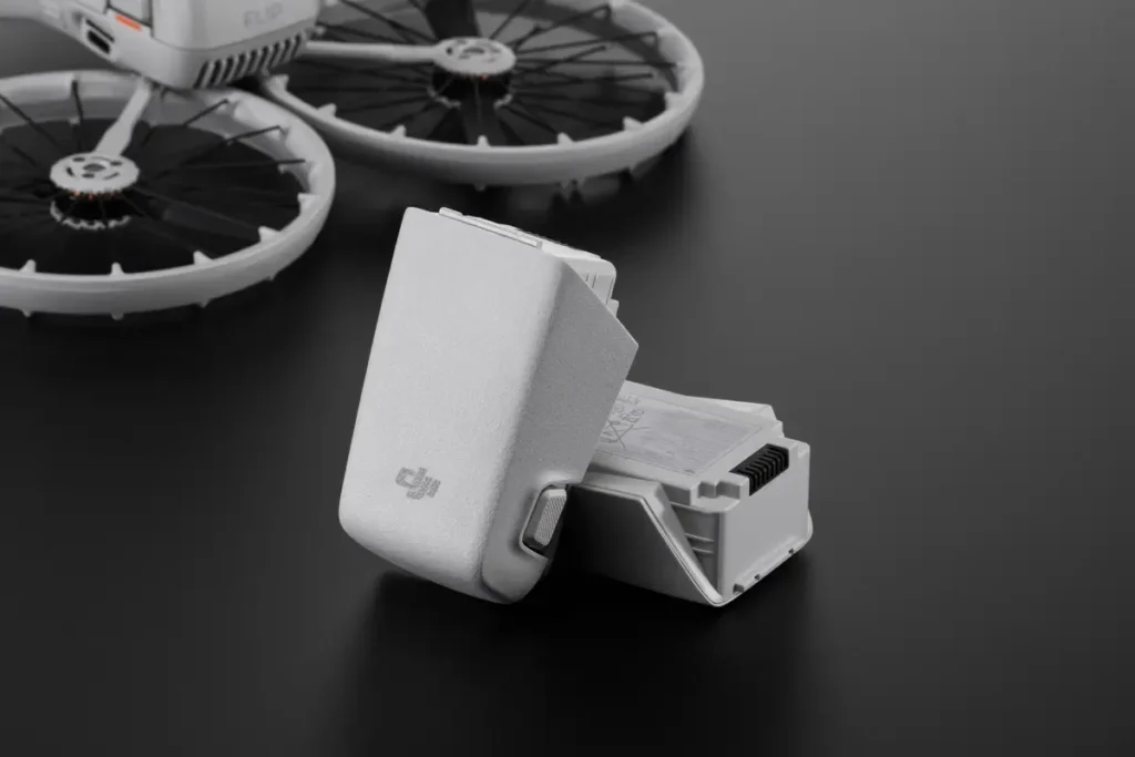 DJI Flip Intelligent Flight Battery shown with drone in the background