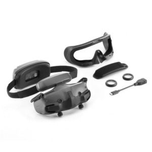 DJI Goggles 3 with accessories including head strap, face cushion, diopter lenses, and charging cable.