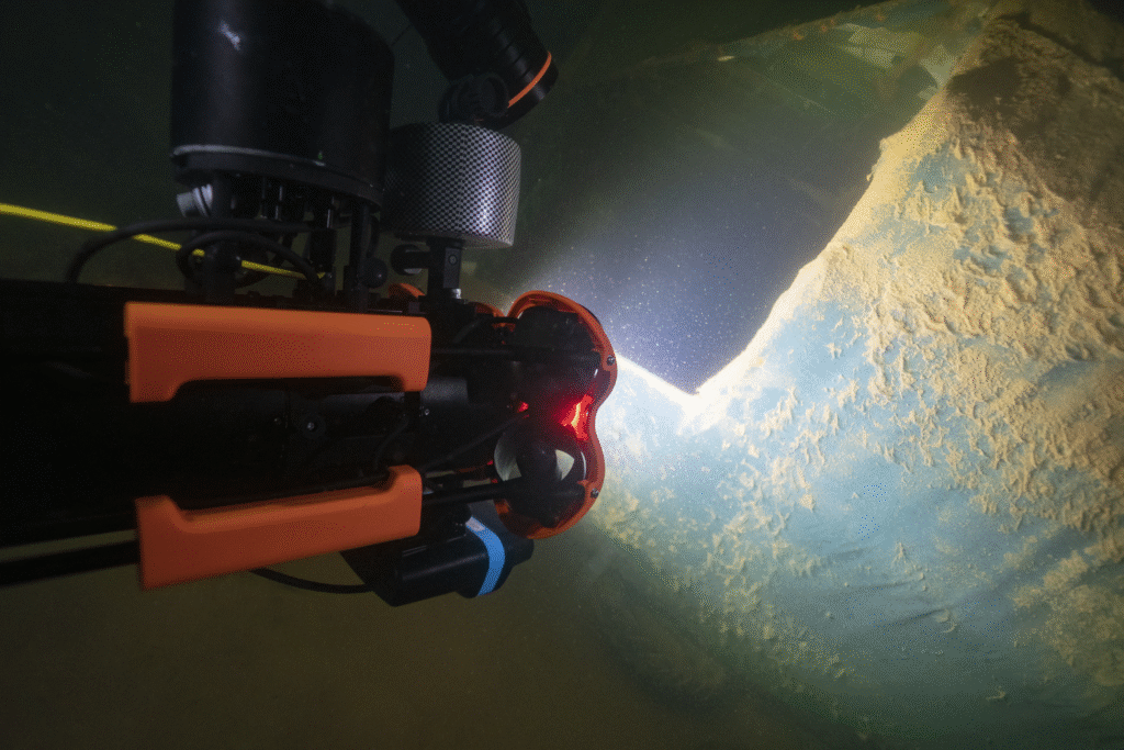 Chasing M2 Pro Advanced underwater ROV performing inspection in deep-sea conditions with bright LED lights