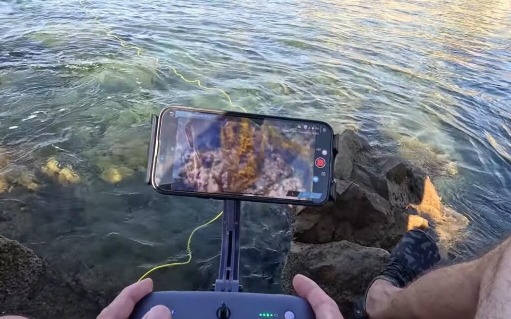 Dory Explore underwater drone capturing HD footage beneath the surface with LED lights.