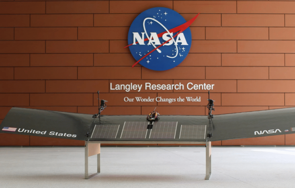 Experimental drone flying over desert dunes during NASA Mars drone testing campaign.