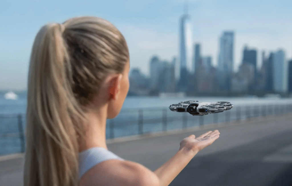 DJI Neo 2 Fly More Combo drone hovering above a landscape, capturing stabilized 4K footage for travel and vlogging.