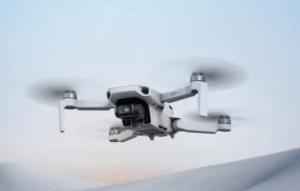 DJI Mini 4K Fly More Combo ultra-light drone on table with controller and batteries
