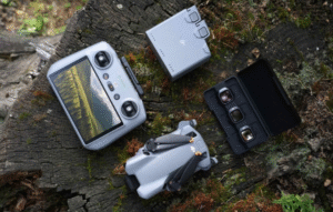 DJI Mini 5 Pro Fly More Combo (RC 2) drone with RC 2 controller, batteries and charging hub arranged on a table