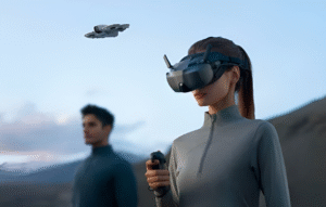 DJI Neo Motion Fly More Combo mini drone with RC Motion controller, FPV goggles and three batteries arranged on a desk