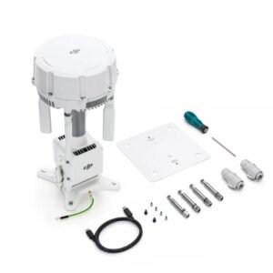 High-angle overview of the main unit alongside its full unboxed installation kit, including a mounting plate, screwdriver, cables, and heavy-duty screws - DJI O4 Ground Station